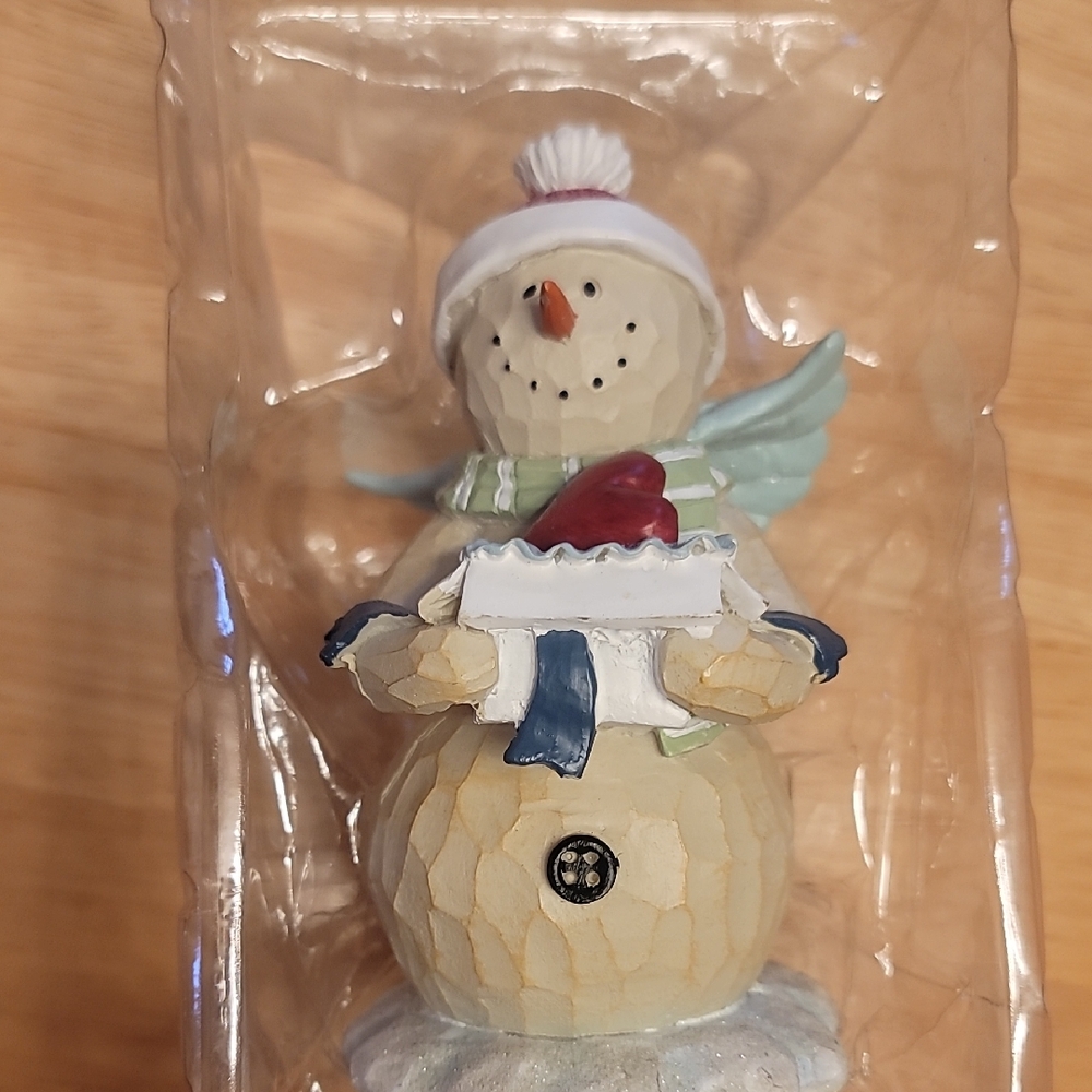 Festive Snowman Figurine with Red and Blue Accents
